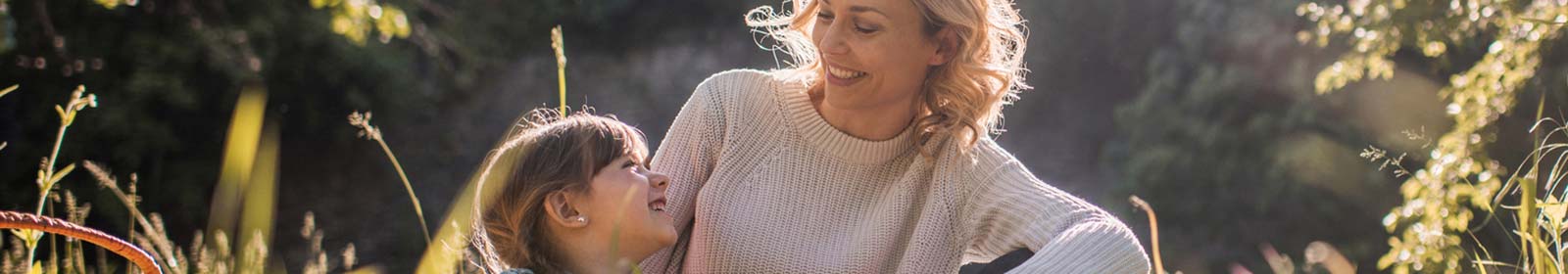 Parent and child in the outdoors.